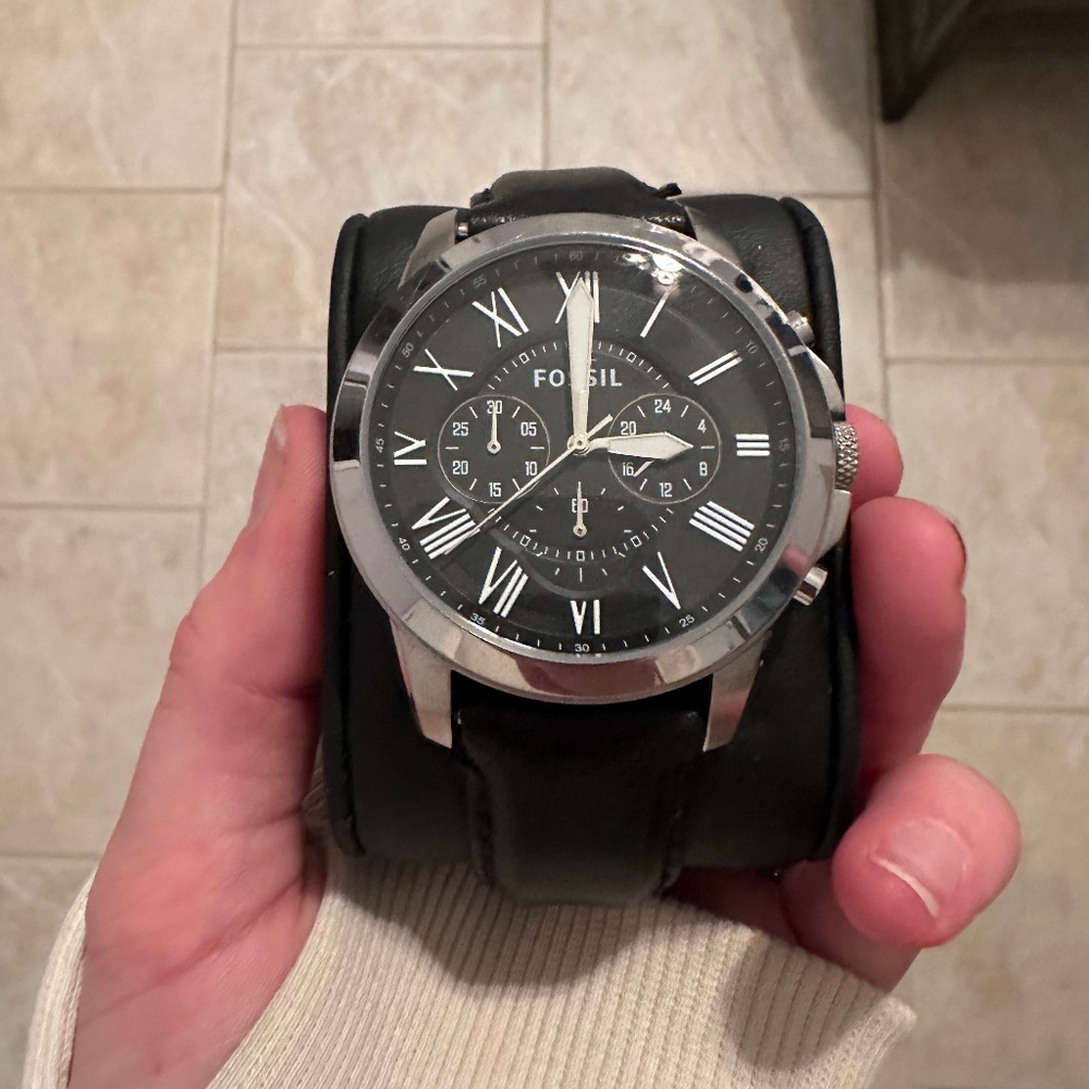 Black strapped Fossil watch